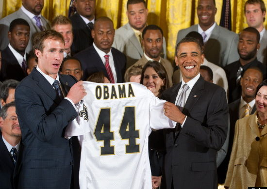 President Obama with Saints jersey.